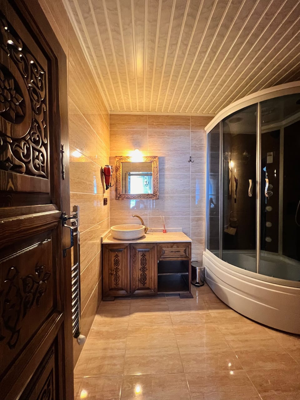 Shower, free toiletries, hair dryer, slippers
