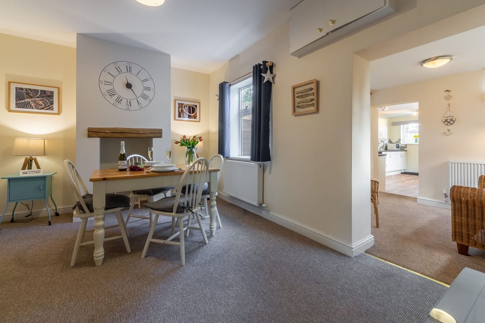 Ground floor: Dining room through to snug