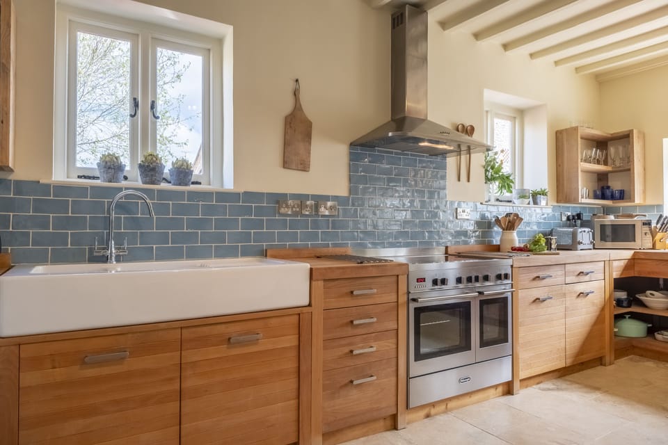 Ground floor:  Kitchen with a butlers sink and range cooker