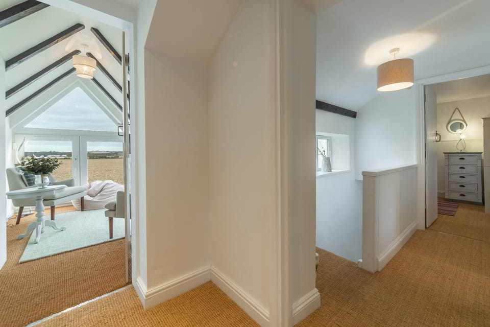 First floor: Landing with doors to all rooms