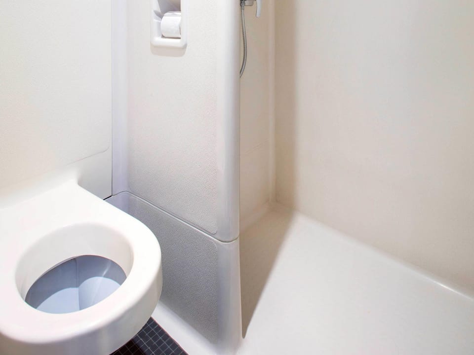 Desk, blackout drapes, cribs (free), WiFi (free)