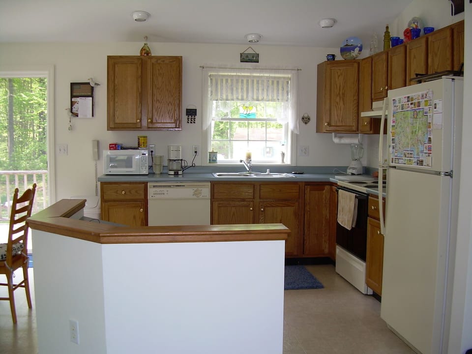 open concept kitchen/dining/living room