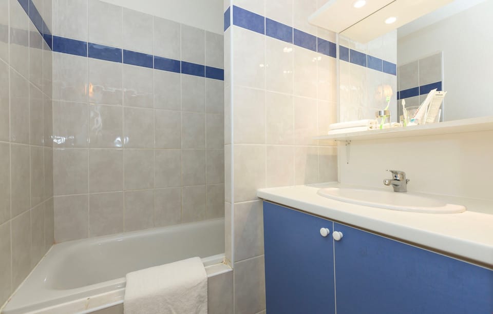 Prepare for your day outside in the spacious bathroom.
