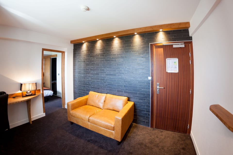 Junior Suite, Mountain View | Living area | 30-inch flat-screen TV with digital channels, TV, first-run movies