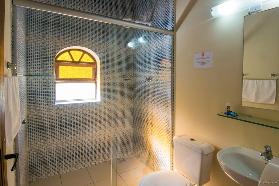 Standard Room, Private Bathroom | Bathroom | Shower, towels, soap, shampoo