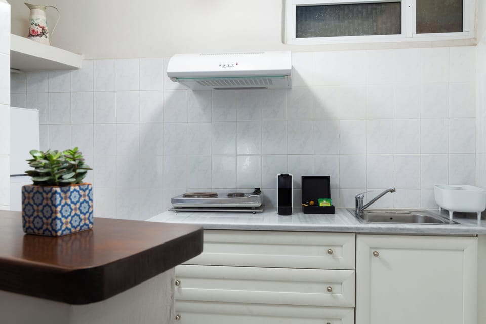 Fridge, stovetop, espresso maker, electric kettle