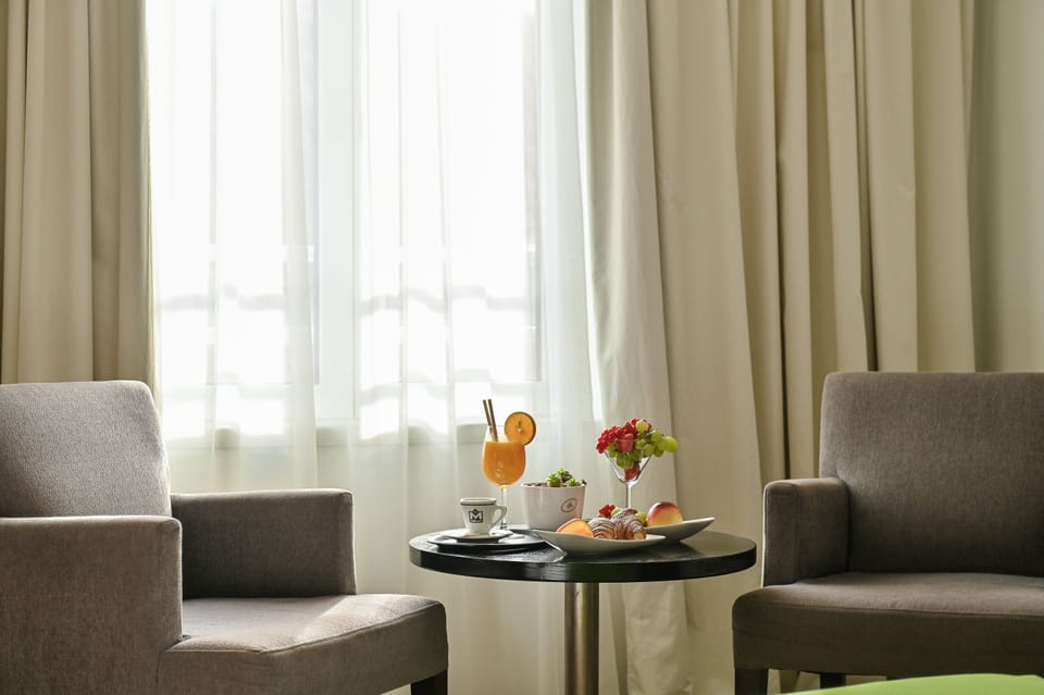 Double Room, City View | In-room safe, soundproofing, iron/ironing board, cribs/infant beds