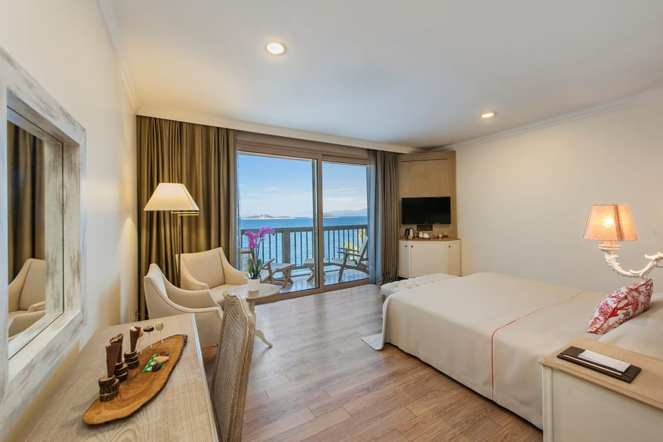 Family Room, 2 Bedrooms | Minibar, in-room safe, individually decorated, individually furnished