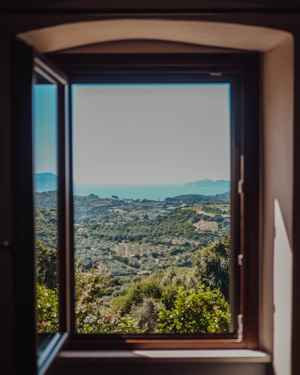 Suite, Garden View | Down comforters, minibar, in-room safe, desk