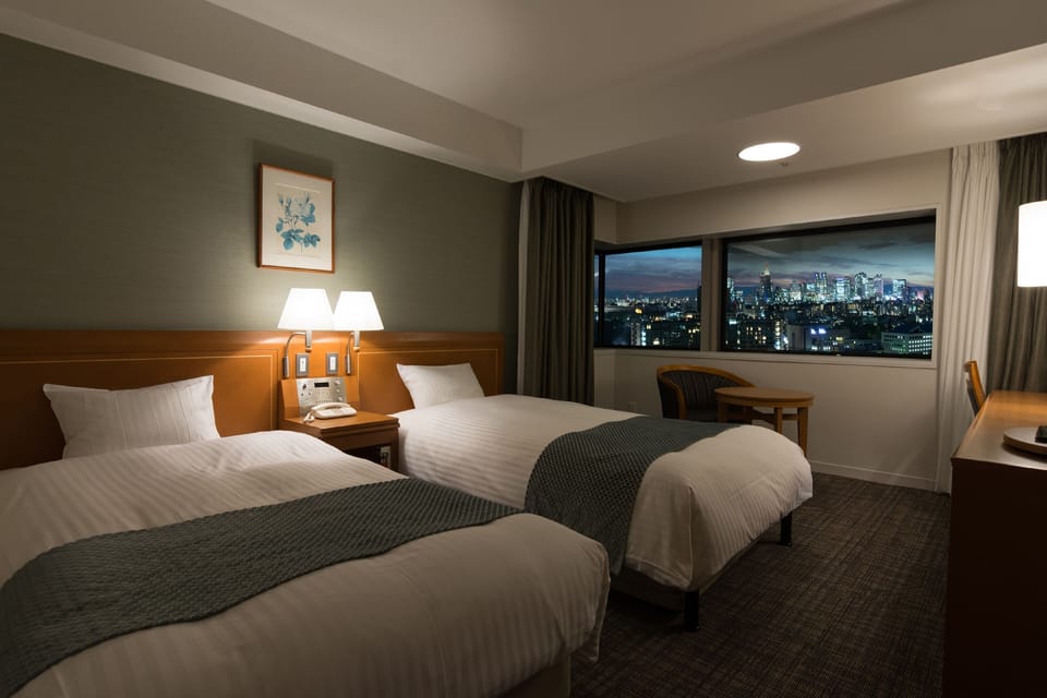 Premium bedding, down comforters, in-room safe, desk
