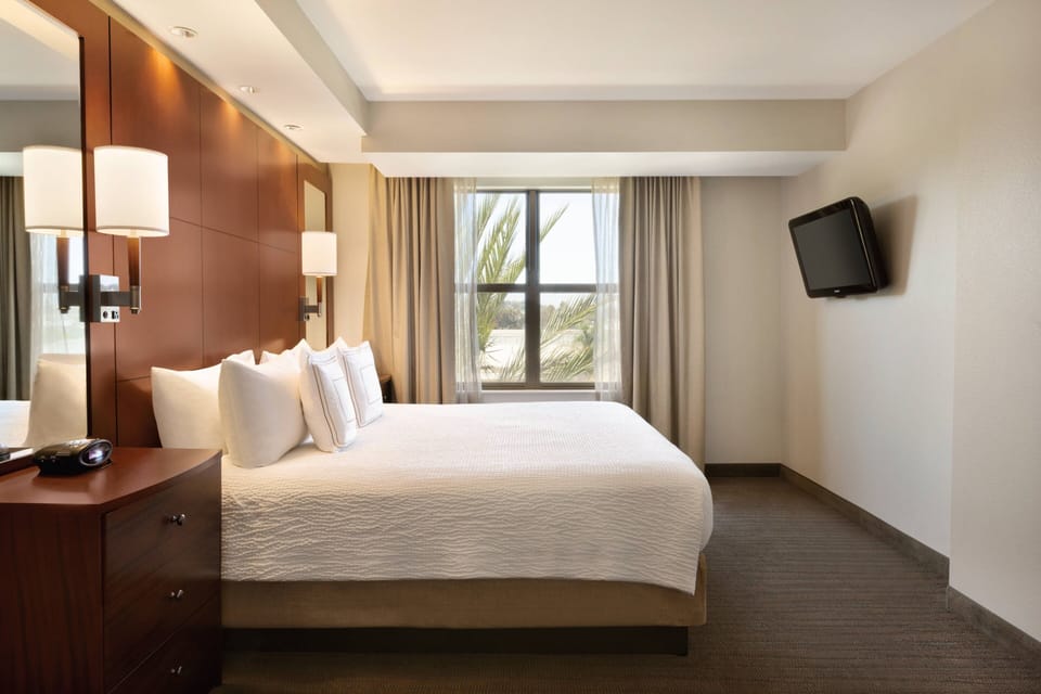 Premium bedding, down comforters, desk, iron/ironing board