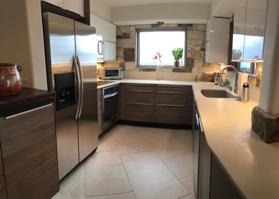Top end appliances in kitchen.