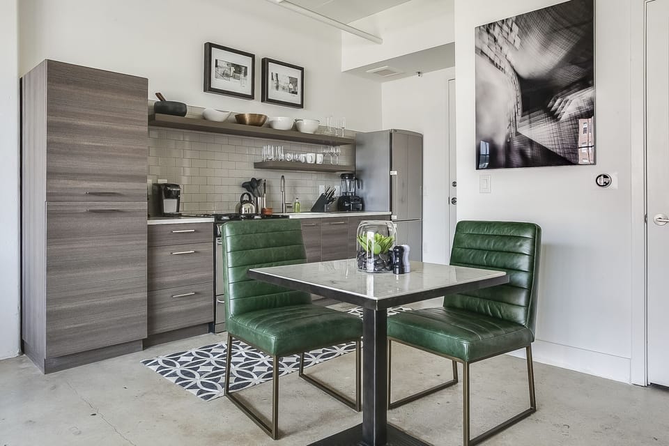This Flat At Ponce City Market has a dining area with seating for two