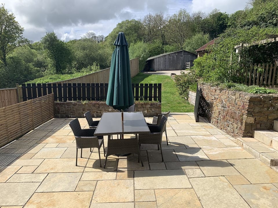 Looking out from living area towards driveway, perfect spot for a sundowner!