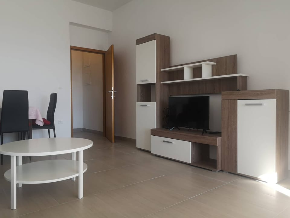 Seating/dining place with TV.