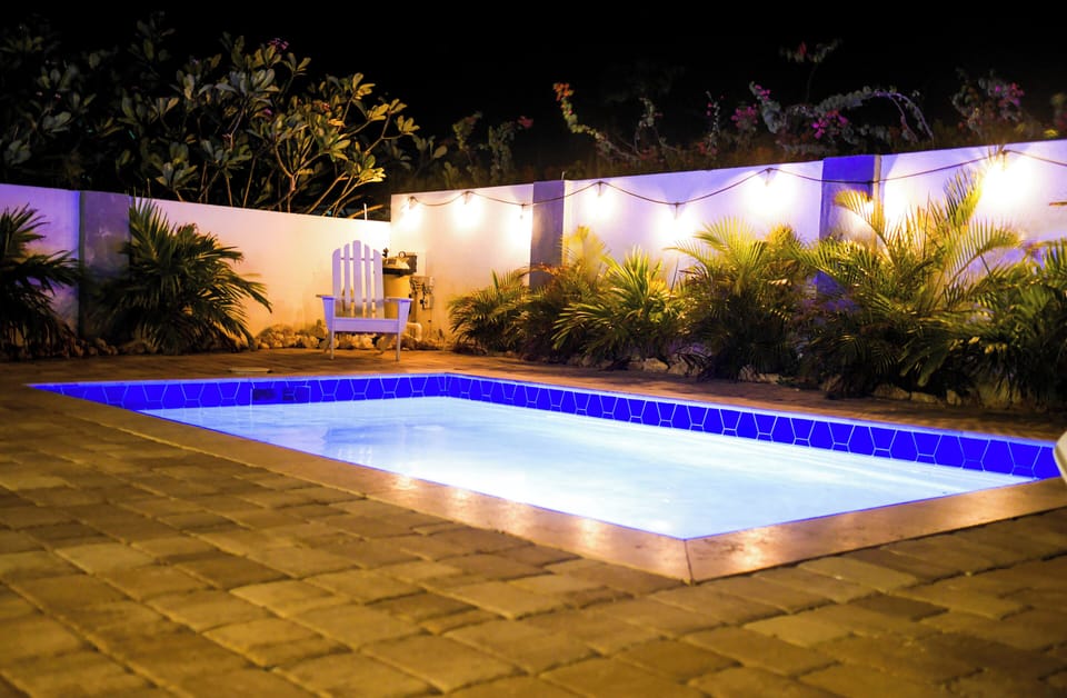 Extremely peaceful relaxing by the pool at night. 
