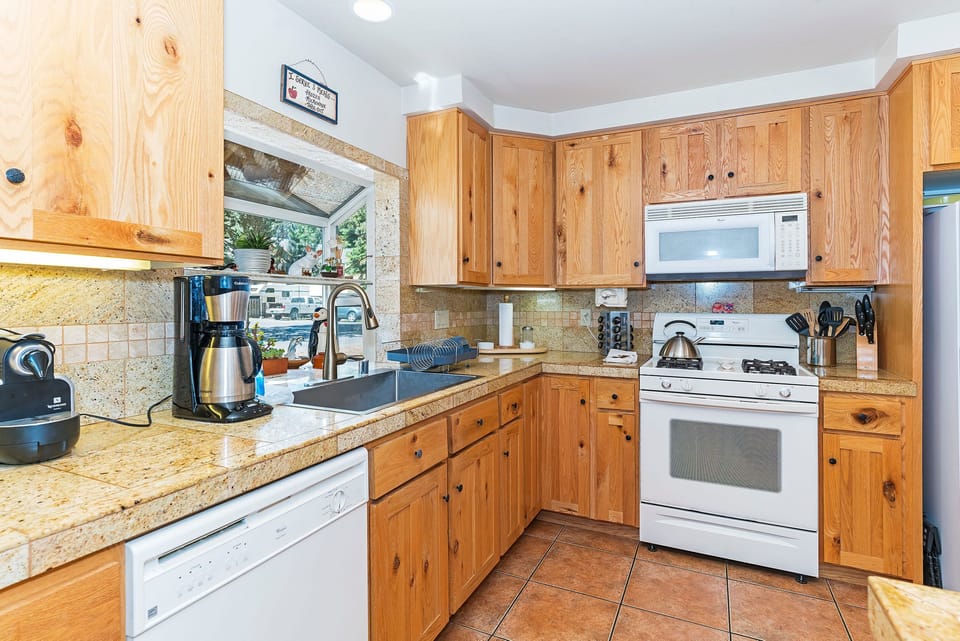 Open and bright kitchen with custom cabinets