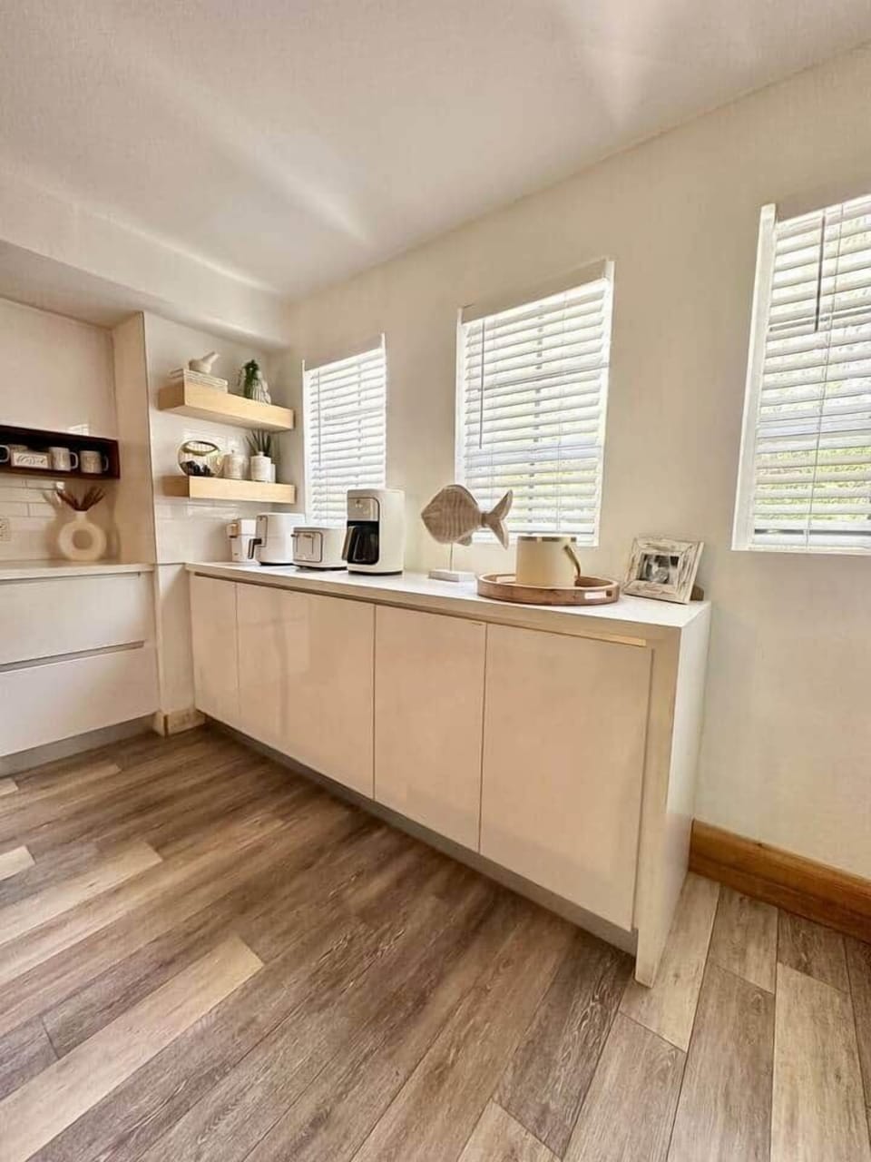 A chef’s dream featuring premium appliances, ample prep space, and a bright, inviting design that makes every meal enjoyable.