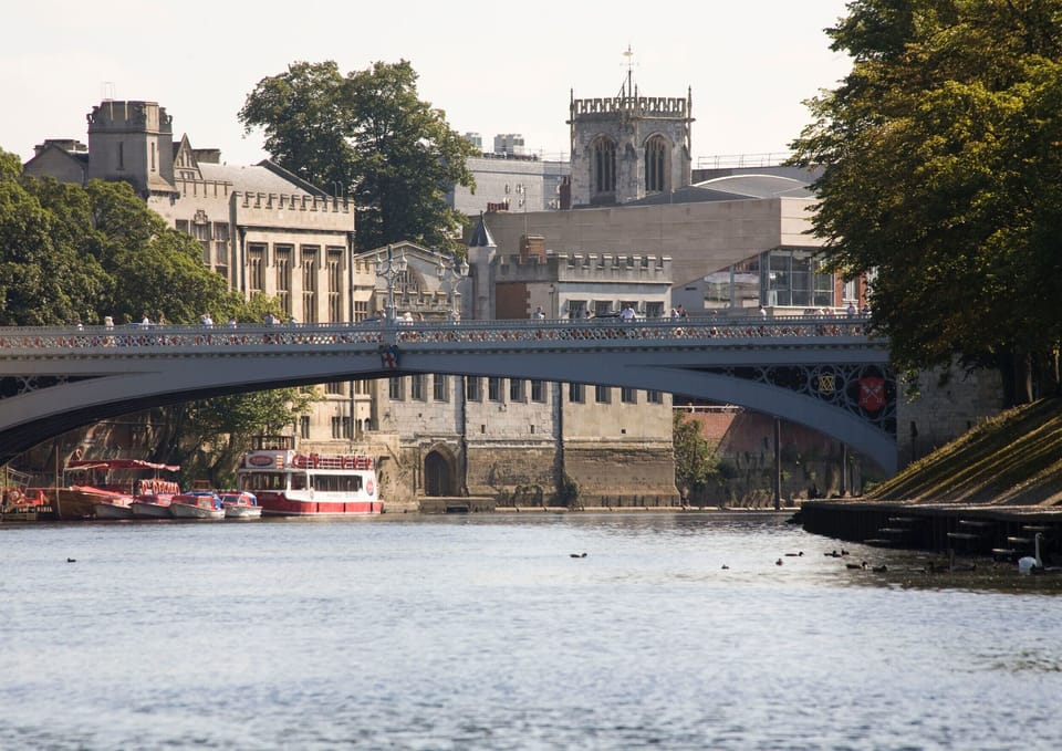 View of Lendal Bridge from the banks of the River Ouse. Photo credit to Visit York.