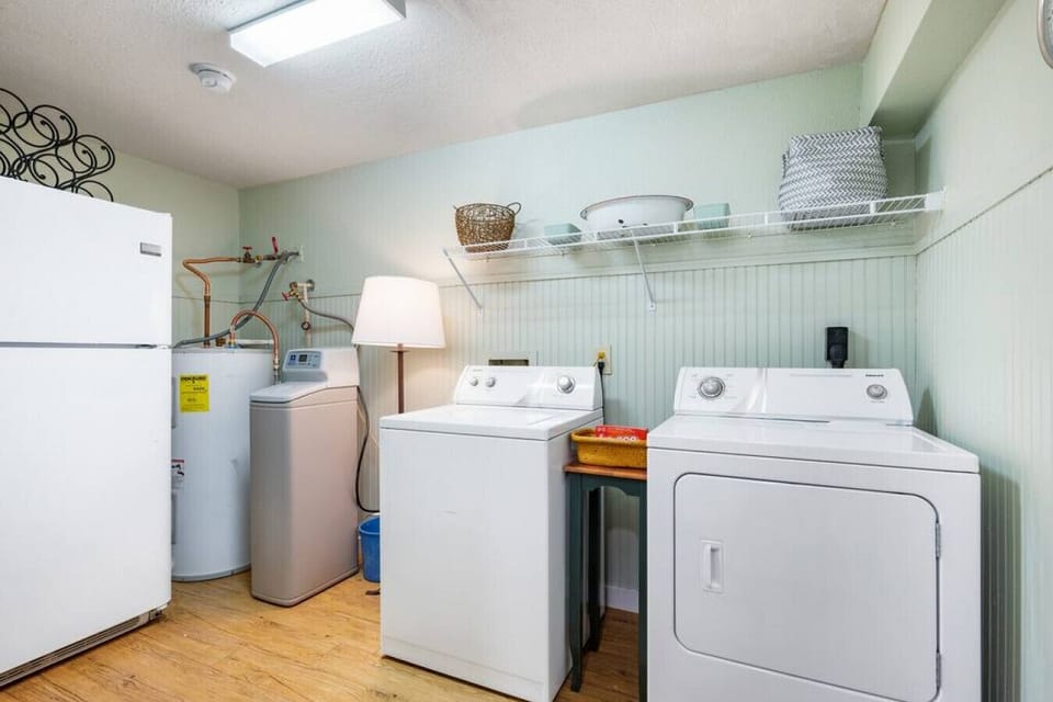 Laundry room with additional refrigerator