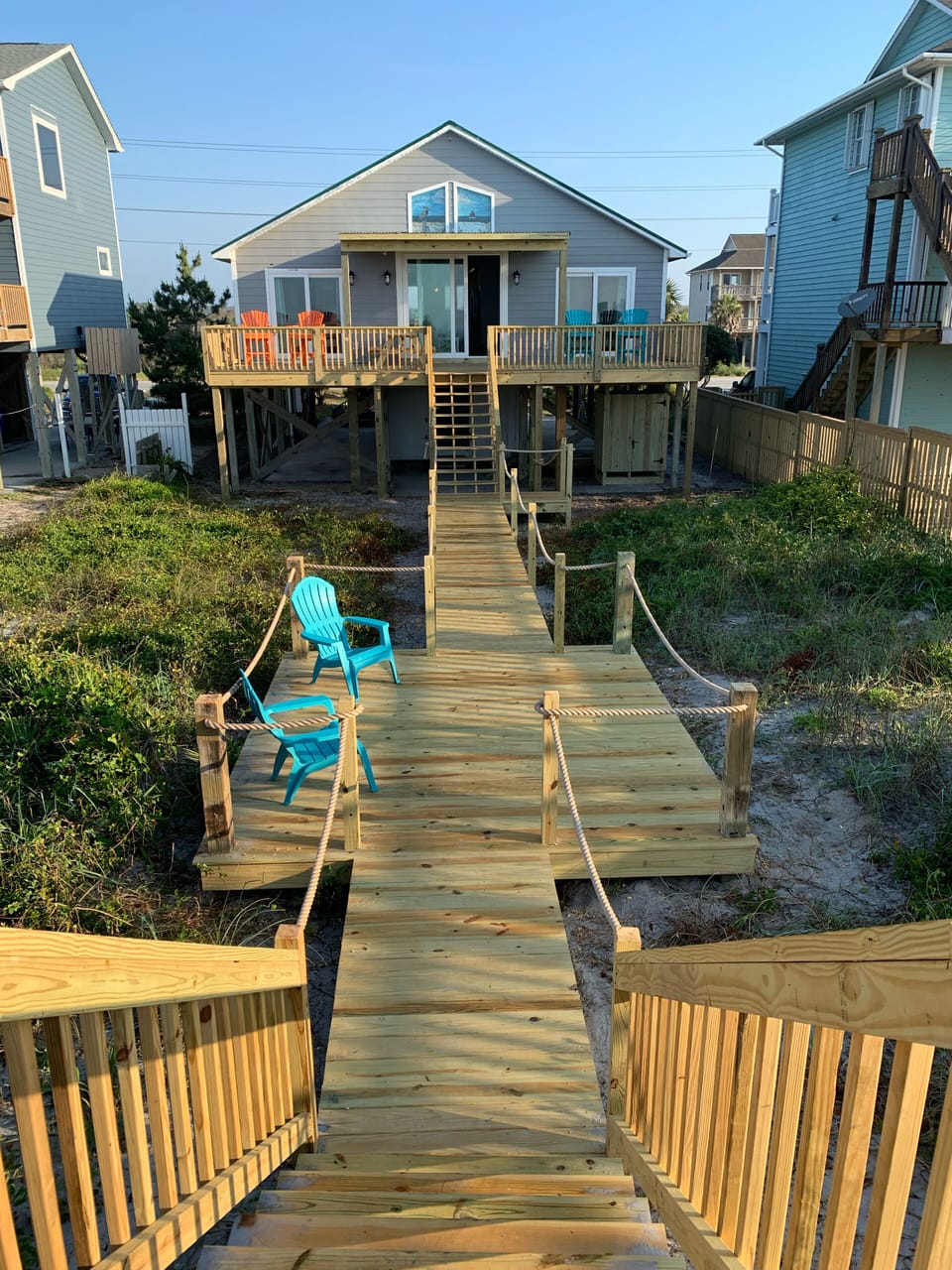 View of the back of the house and walkway to the beach