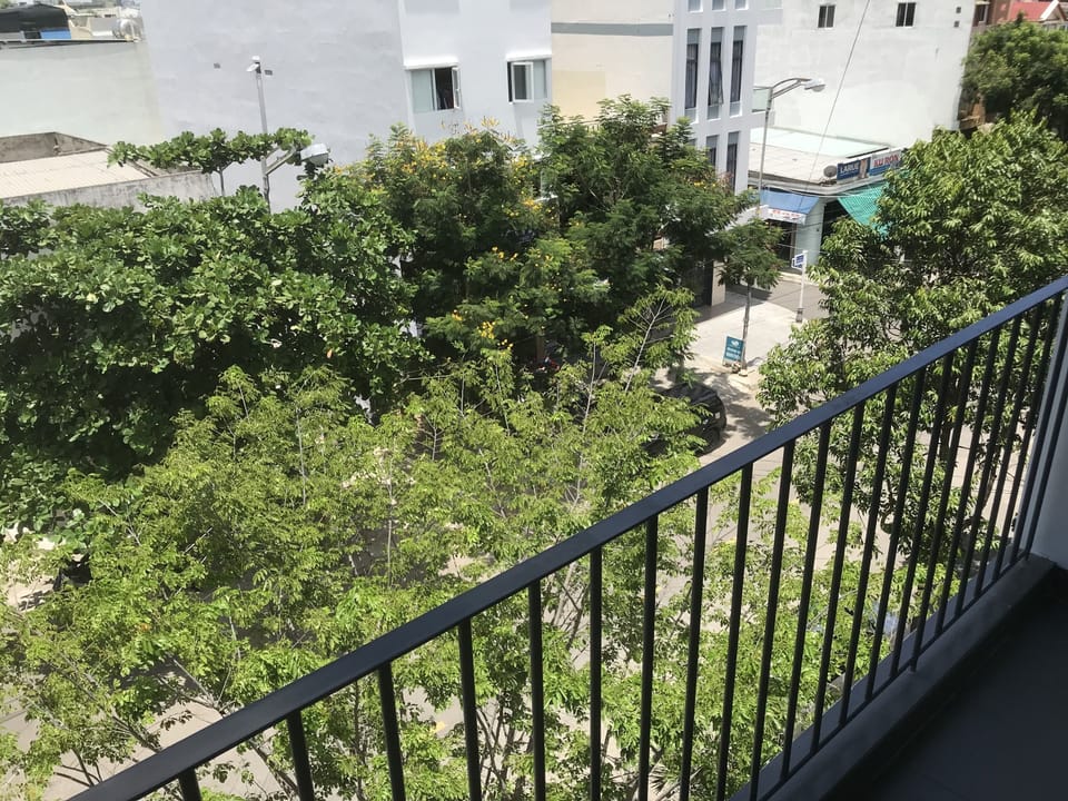 Street view from balcony. You can smoke here!