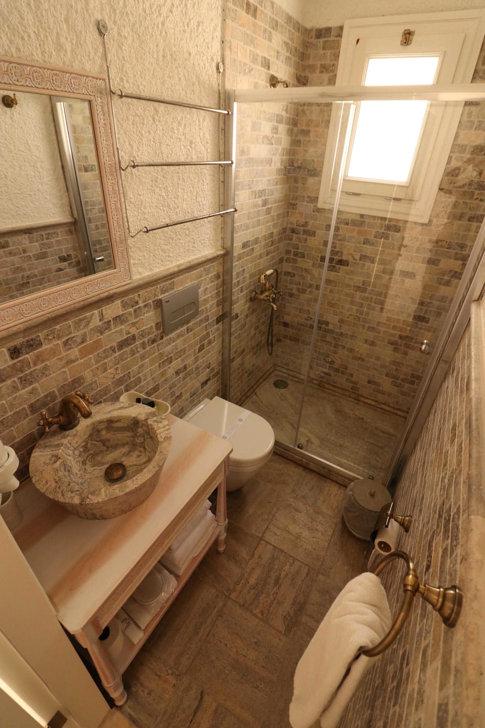 Shower, hydromassage showerhead, designer toiletries, hair dryer