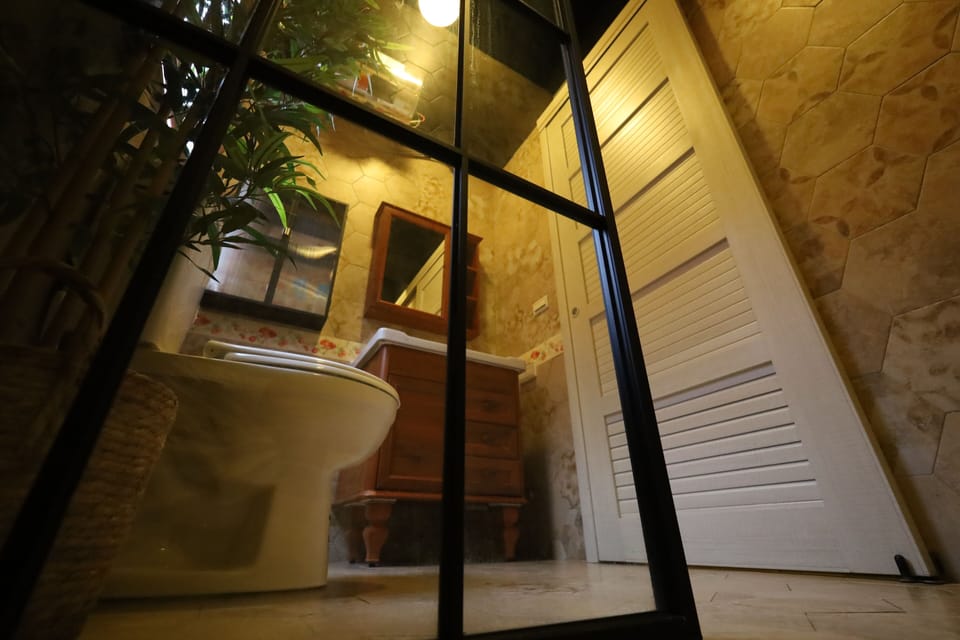Classic Double Room | Bathroom | Hair dryer, slippers, towels, toilet paper