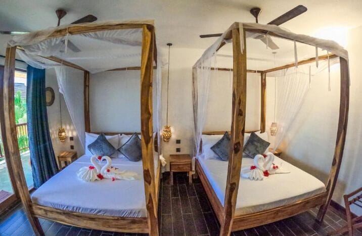 Family Bungalow, 2 Queen Beds, Garden View | In-room safe, individually decorated, individually furnished, bed sheets