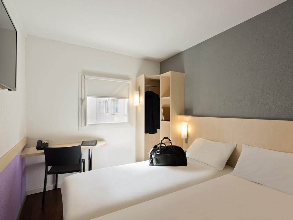 Twin Room, 2 Twin Beds | Desk, soundproofing, iron/ironing board, free cribs/infant beds