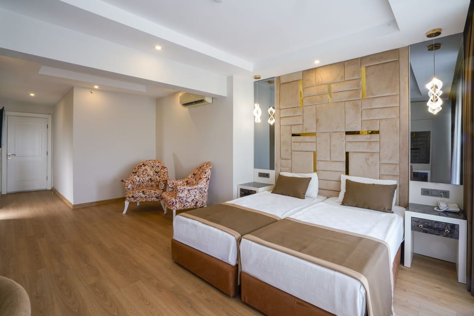 Family Quadruple Room, 2 Bedrooms | 1 bedroom, minibar, in-room safe, desk