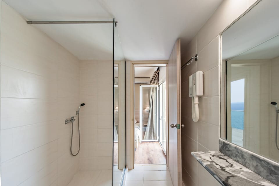 Classic Double Side Sea View | Bathroom | Shower, free toiletries, hair dryer, slippers