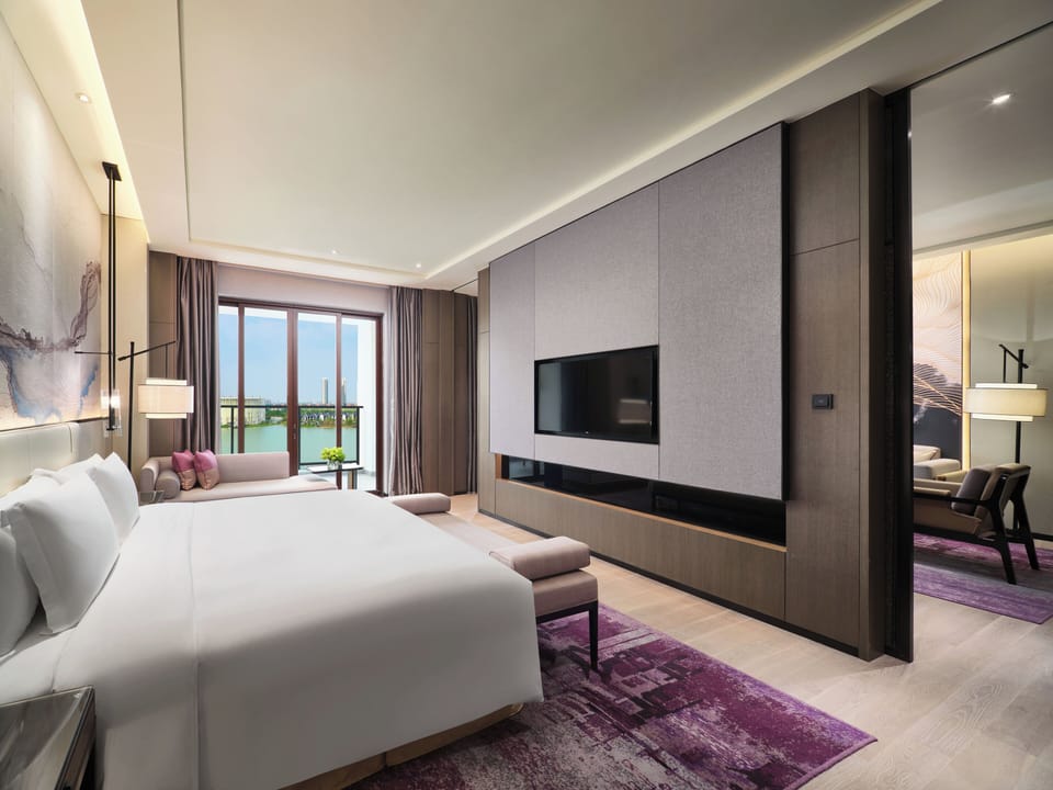 Junior Suite, 1 King Bed (Additional Living Area) | Minibar, iron/ironing board, WiFi (free), bed sheets