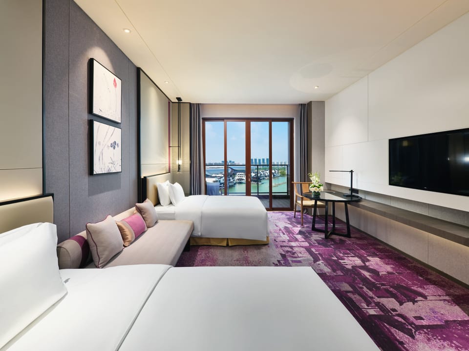 Minibar, iron/ironing board, WiFi (free), bed sheets