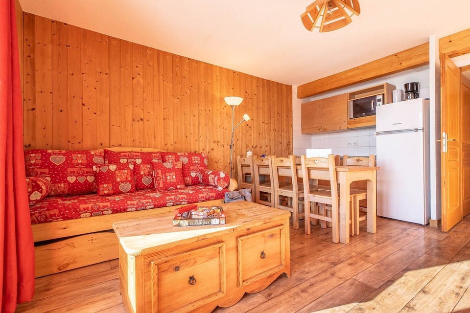 Prepare meals in the kitchenette and enjoy them at the dining table.
