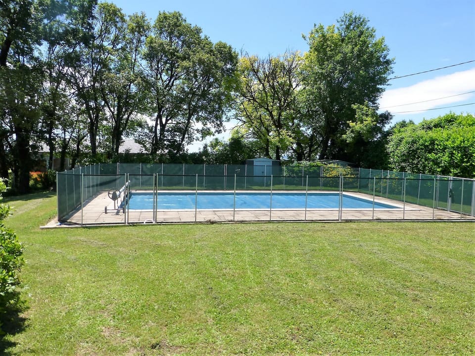 Private Pool with safety fencing.