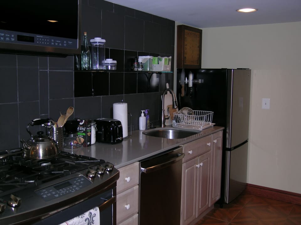 Microwave, toaster, coffee-maker with coffee, refrigerator, stove & dishwasher!