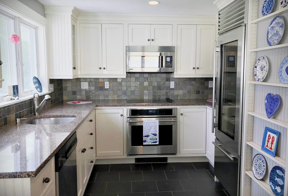 Newly renovated kitchen with modern stainless steel appliances.