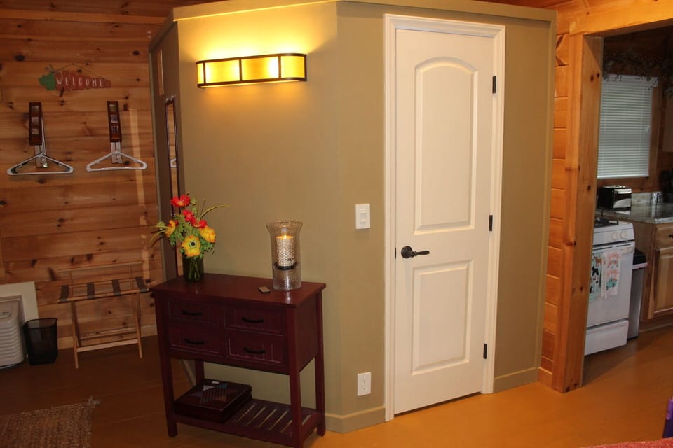 Entry to bath. Entry to kitchen on right