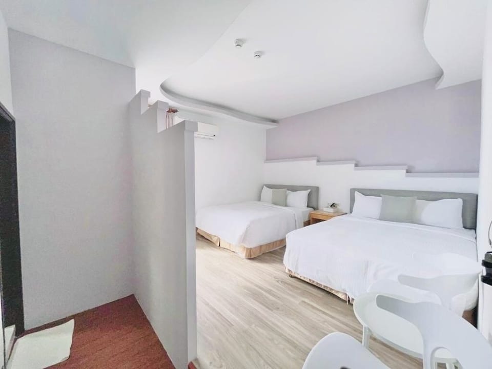 Standard Quadruple Room | Desk, blackout drapes, free WiFi, bed sheets