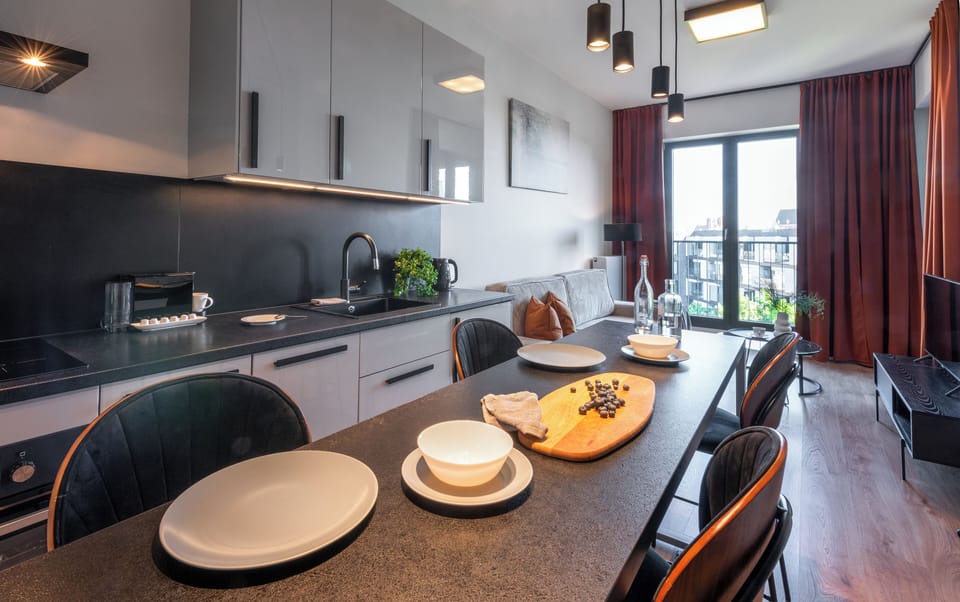 Deluxe Apartment, Balcony, Courtyard View | Private kitchenette | Fridge, stovetop, dishwasher, espresso maker