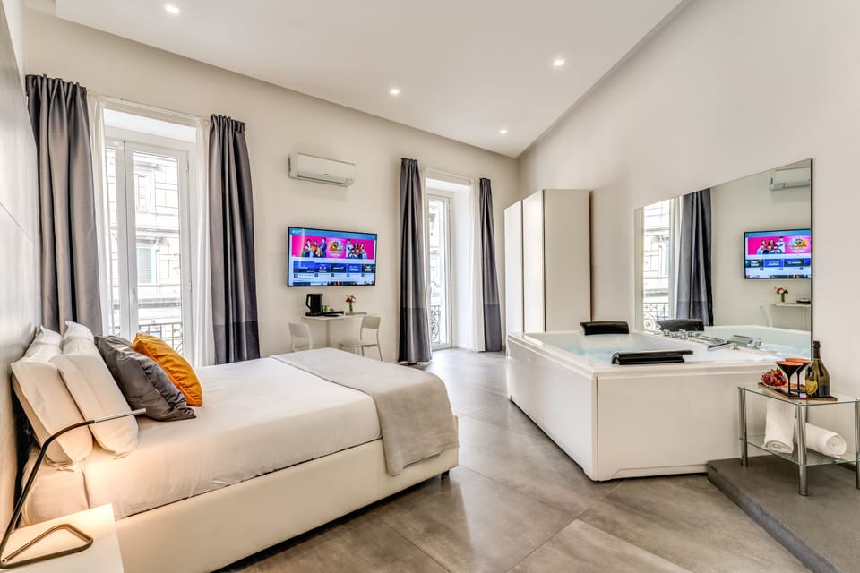 Deluxe Suite, Sauna | 1 bedroom, premium bedding, minibar, in-room safe