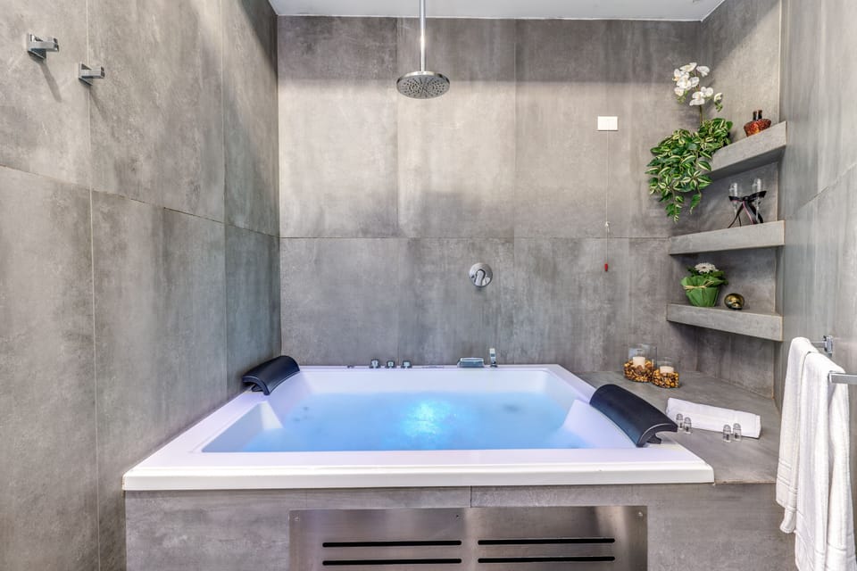 Suite, Jetted Tub | Bathroom | Hair dryer, bidet, towels, soap