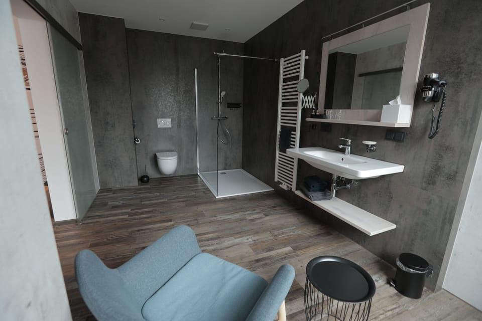 Comfort Double Room | Bathroom | Shower, hair dryer, towels, soap