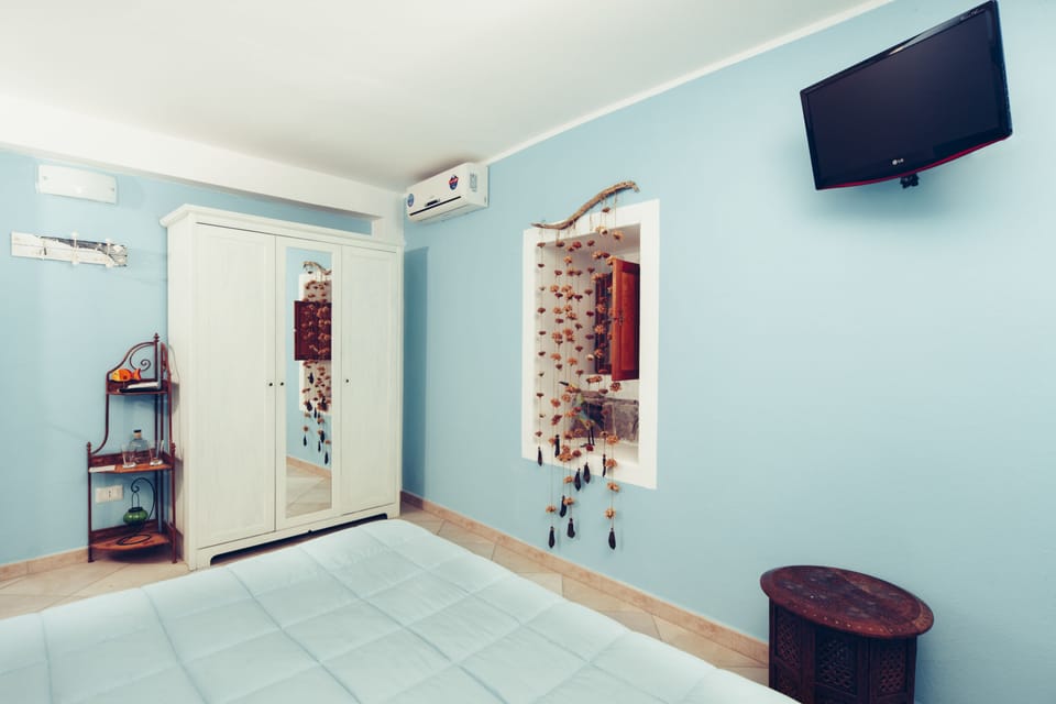 Luxury Room, Ground Floor (Brezza Marina) | Individually decorated, individually furnished, soundproofing, free WiFi
