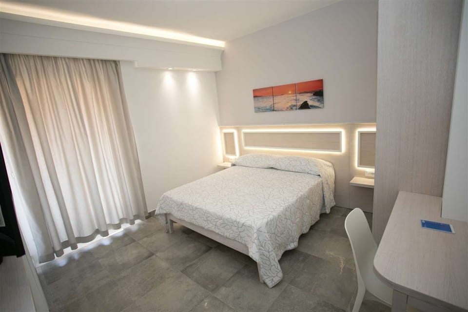 Double or Twin Room, Balcony | Minibar, in-room safe, desk, blackout drapes