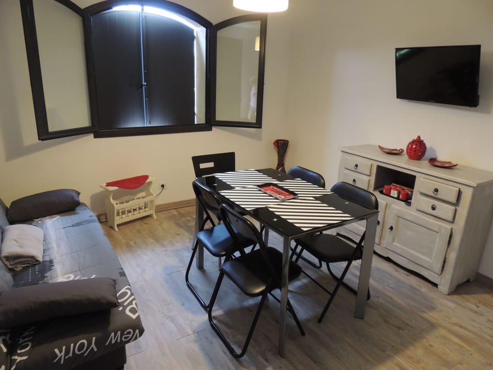 Panoramic Apartment | Living room | Flat-screen TV