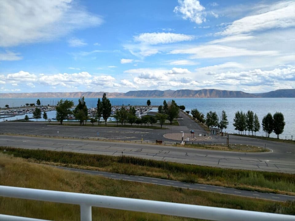 Enjoy breathtaking lake and mountain views from the comfort of your private balcony retreat.