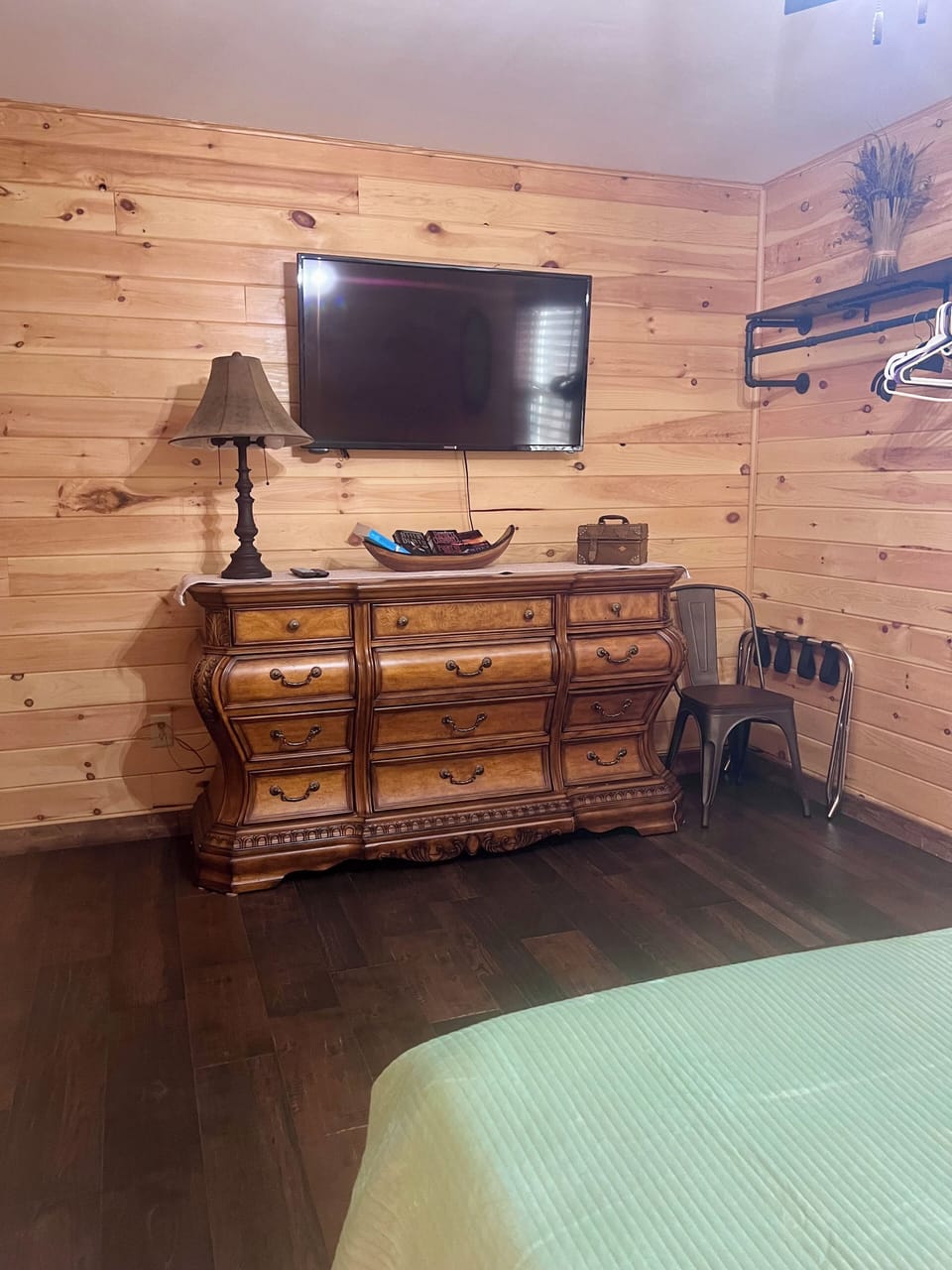 Master bedroom features a 50 inch Roku TV.