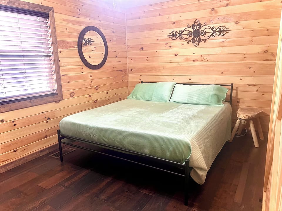 Master bedroom features a California King bed.